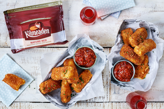 Breadded and fried mature red cheddar sticks with spicy tomato dip