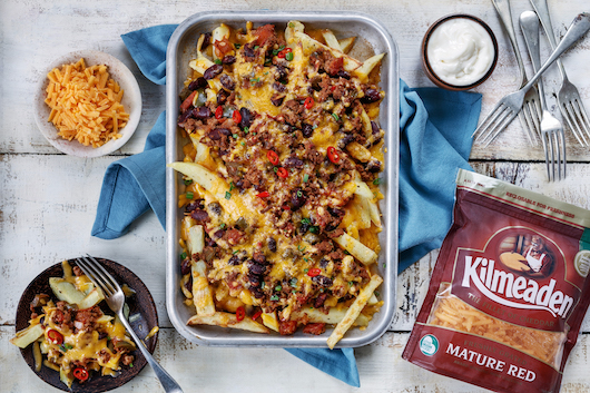 Kilmeaden mature red cheddar cheese chilli chips with sour cream on the side.
